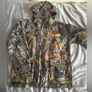 Game Winner waterproof camo jacket. Boys size medium.